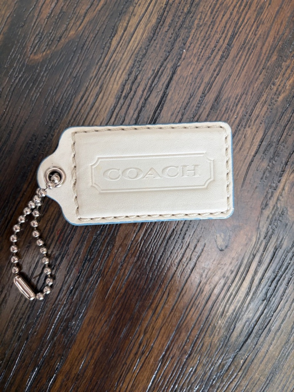 COACH Cream Leather Key Tag with light blue trim Embossed Logo